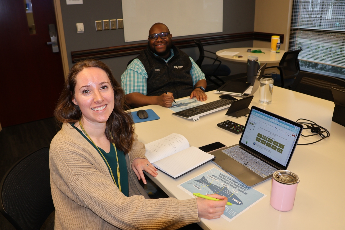 Sirocus Barnes and Katherine King working.