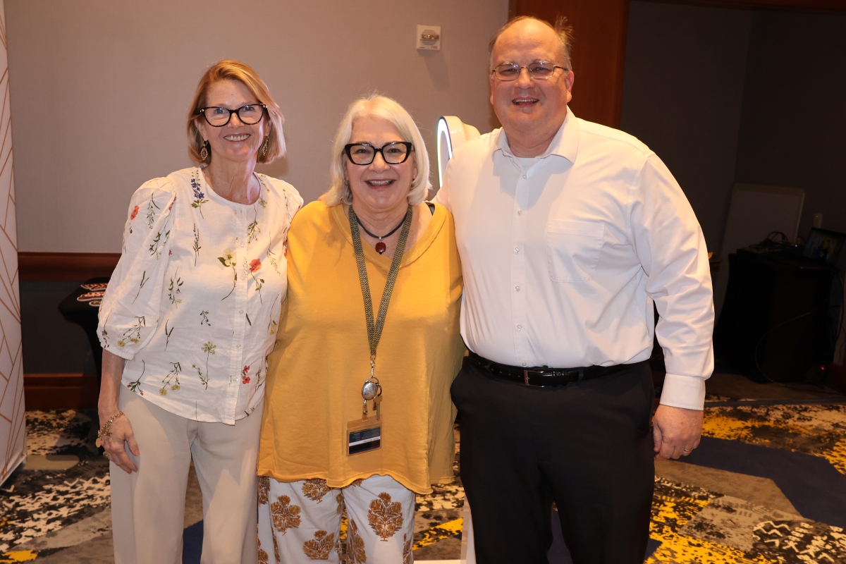 Leigh McCook, Lizanne DeStefano and Sean Mulvanity pose for a photo.