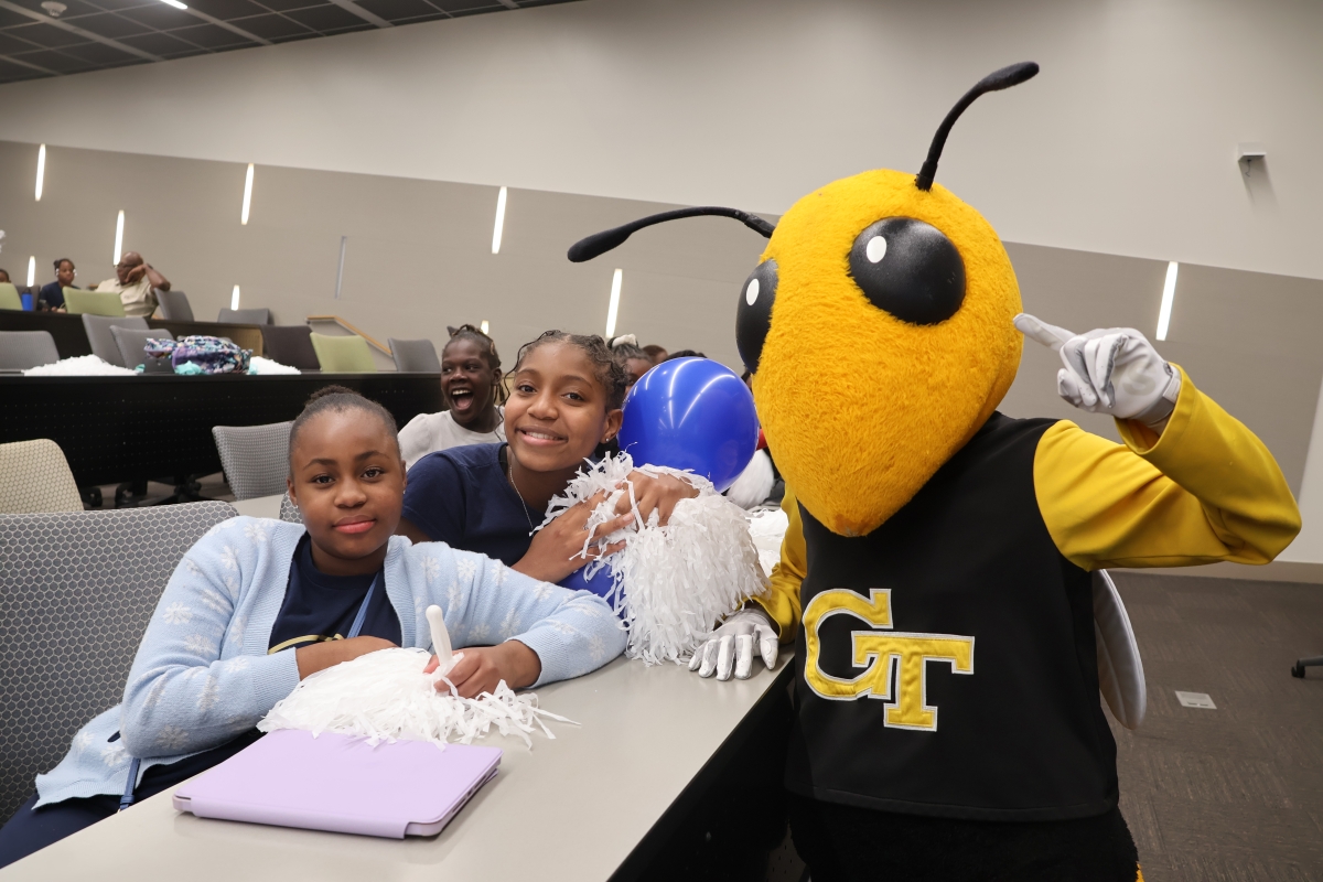 Horizons at Georgia Tech scholars posing for a picture with Buzz.