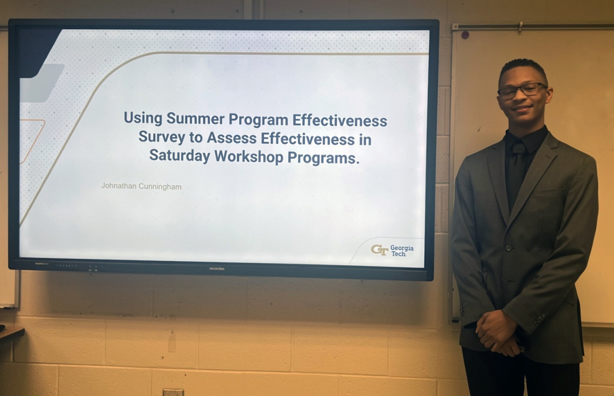Johnathan Cunnigham presented his research project during a school event at the end of the semester.
